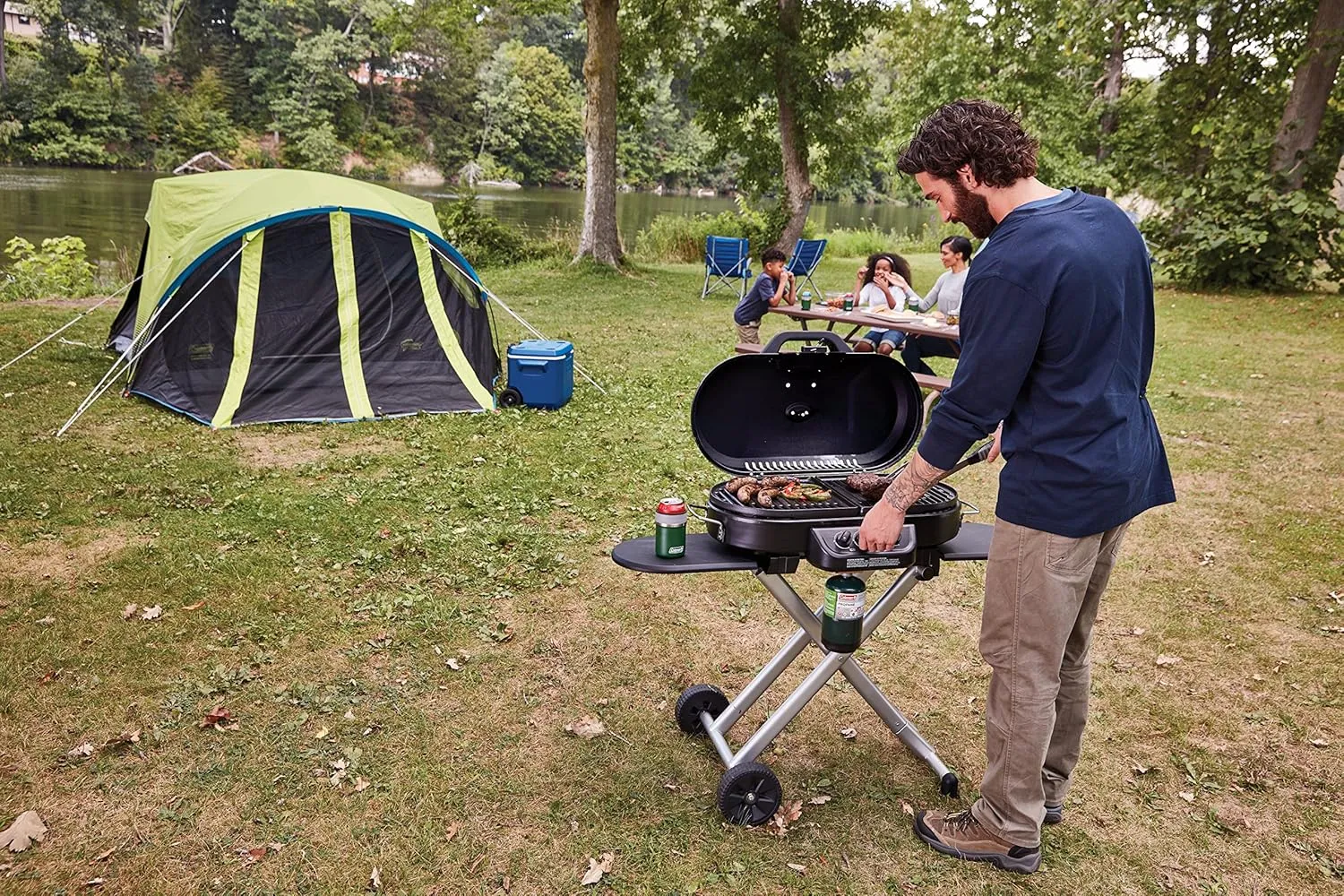 Coleman RoadTrip 285 Portable Stand-Up Propane Grill Gas Grill with 3 Adjustable Burners and Instastart Push-Button Ignition; Grease Tray Side Tables Thermometer Folding Legs & Wheels Included